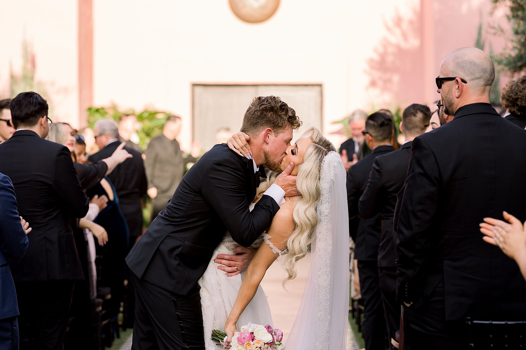 Bride and Groom Kiss After Wedding Ceremony at Sands Hotel