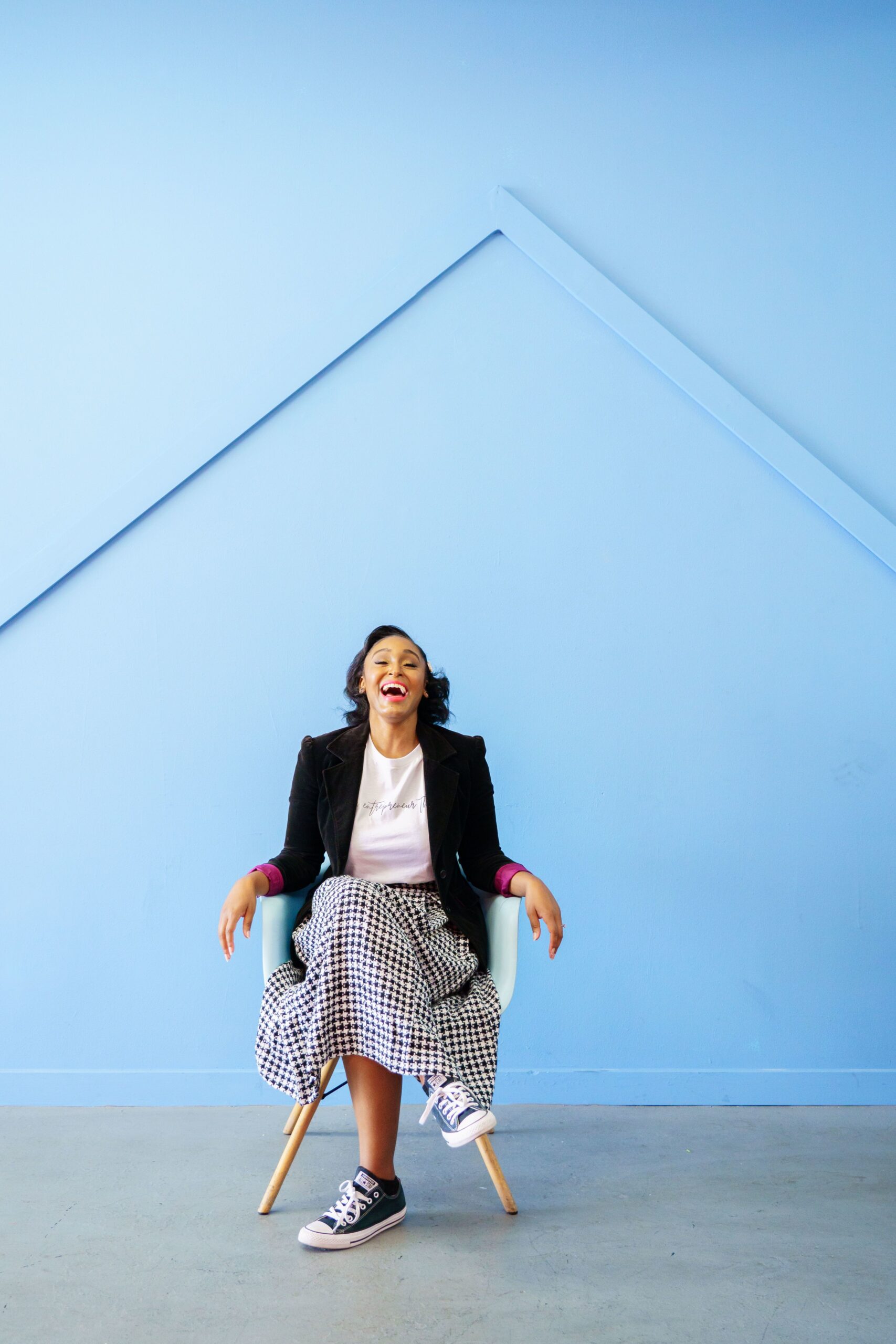 girl in chair laughing