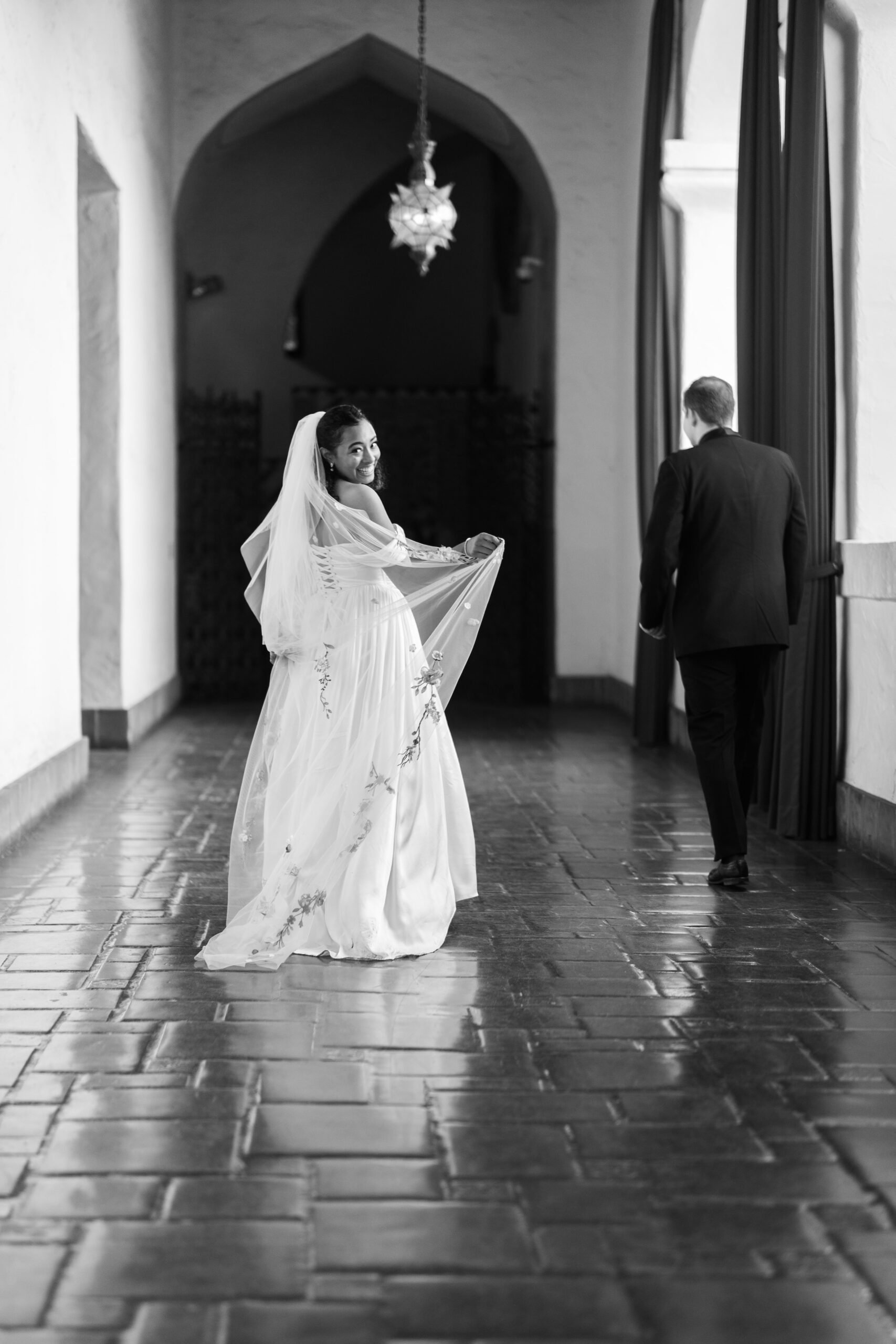 Bride and Groom Walking to Mural Room at Santa Barbara Courthouse